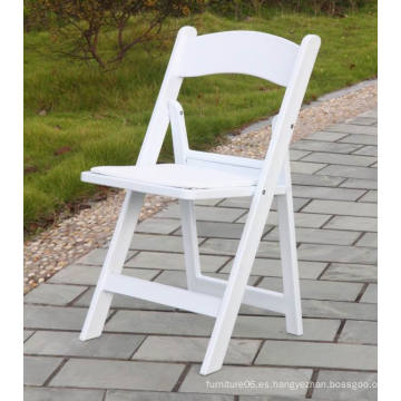 Silla plegable de resina blanca acolchada